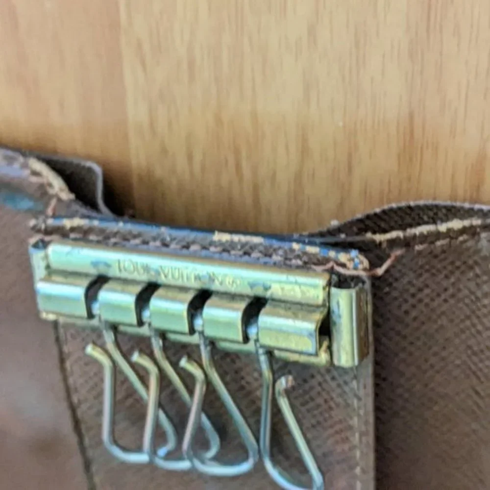 Louis Vuitton please check